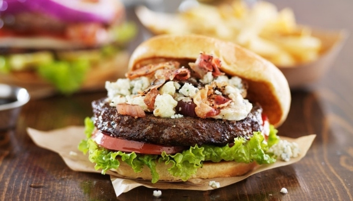 A cheeseburger with bacon and blue cheese, featured on our Food Menu in Dilworth MN.